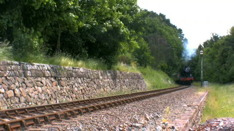Steam train in countryside Stock Footage 140685