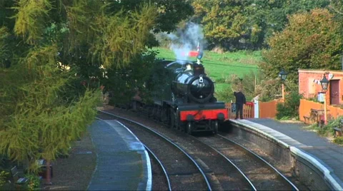 Steam train in the countryside Stock Footage 277428