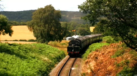 Steam train in countryside Stock Footage 478491