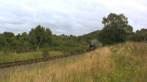 Steam train in countryside Stock Footage 516098