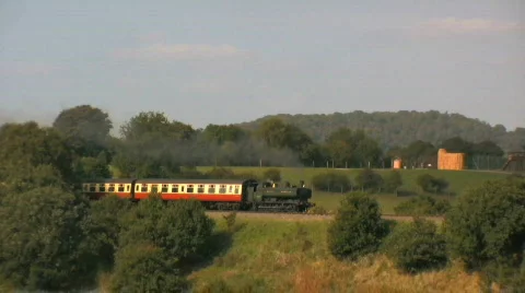 Steam train in countryside Stock Footage 516659