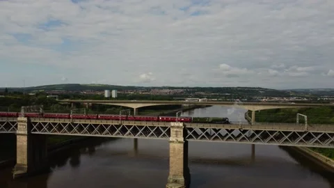 Steam Train Crosses Railway Bridge, Newcastle upon Tyne, UK (Tracking shot) Stock Footage 157159761