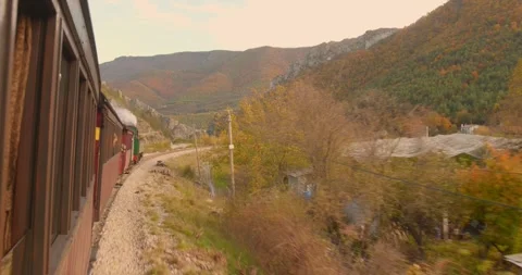 Steam train des pignes moving in Entrevaux, France Stock Footage 333393096