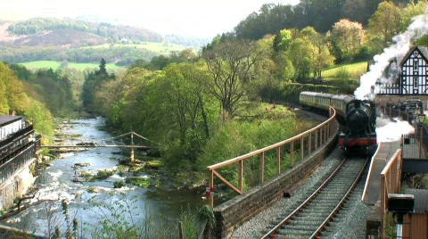 Steam train leaving the Station Stock Footage 710444