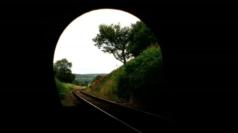 Steam train leaving tunnel Stock Footage 478358