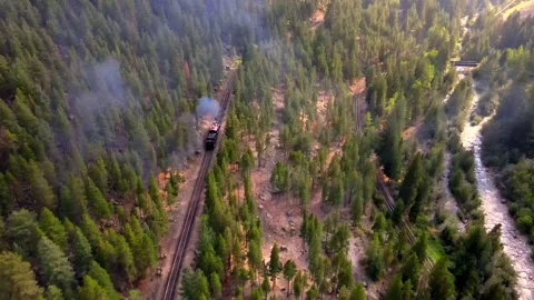 Steam Train on Mountainside Stock Footage 194384368