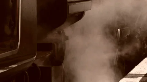 Steam train moves forward slowly in old style shot Stock-Footage 39887422