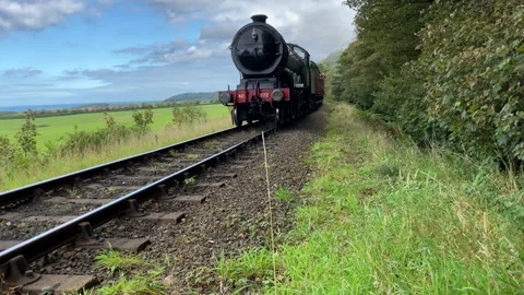 Steam train in Norfolk, UK Stock Footage 143210932