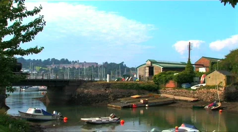Steam train passing by a river Stock Footage 266273