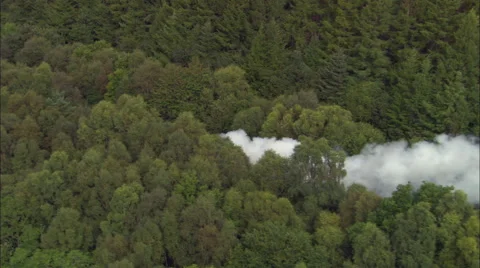 Steam Train Round Alongside Loch Eil Stock Footage 65199670