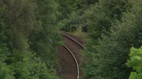 Steam Train Round Corner On Tight Shot Stock Footage 65199669