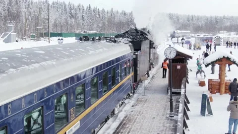 Steam train stand on the platfrom with a passengers Stock Footage 150420686