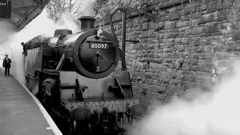 Steam Train in station B&amp;W old style image UK England 4K Stock-Footage 120186667