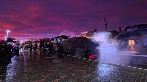 Steam train in the station at sunset Stock Footage 258822763