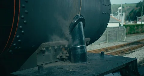 Steam train stopped at the platform Stock Footage 104498811