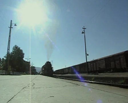 Steam train waiting at platform Stock Footage