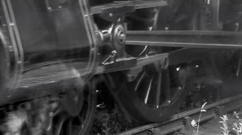 Steam train wheels turning in black and white old shot Vídeos de archivo 64974009
