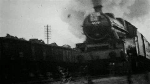 Steam trains. Railway locomotive engine on a passenger train an old B&W film UK Stock Footage
