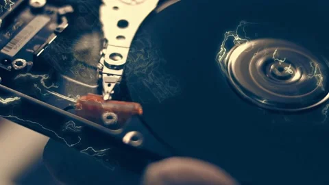 Steam transformation effect of Macro close up of working opened hdd drive hard Stock Footage 239825807