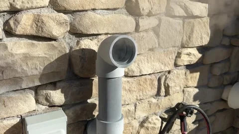 Steam vent pipe on brick wall Stock Footage 319613849