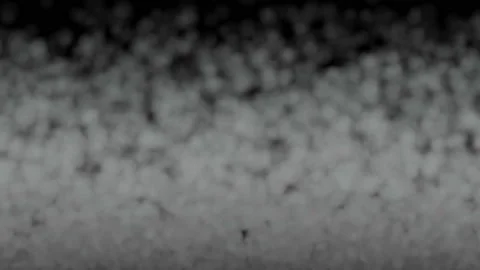 The steam wall falls up and continues to hold on to the black screen in a Stock Footage 109537097