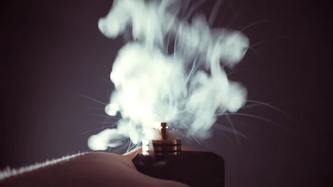 Steam when using vape device, RDA atomizer without top cap, low Ohm clapton Stock Footage 102261857