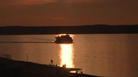 Steamboat on the river at sunset Stock Footage 52778525