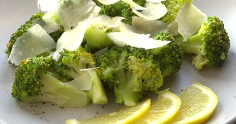 Steamed broccoli with parmesan and lemon. Stock Footage 308073760