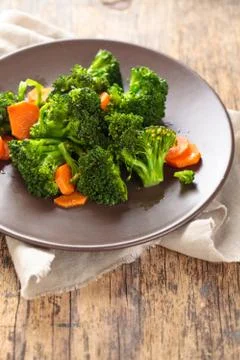 Steamed broccoli on plate. Stock Photos