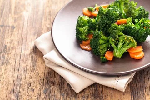 Steamed broccoli on plate. Stock Photos