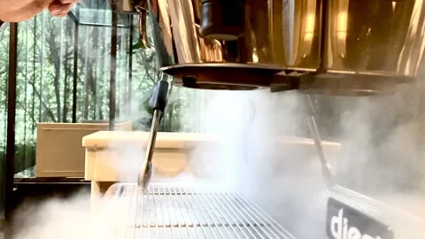 Steamed coffee machine slowmotion Stock Footage 142321560