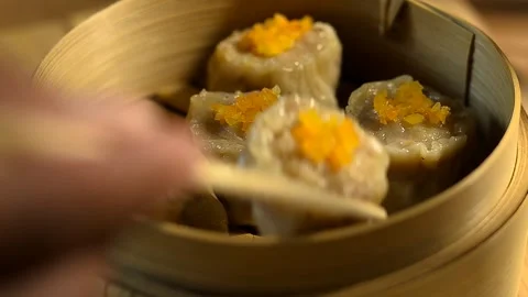 Steamed dim sum in bamboo steamer Stock Footage 337517349