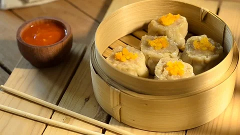 Steamed dim sum in bamboo steamer Stock Footage 337517402