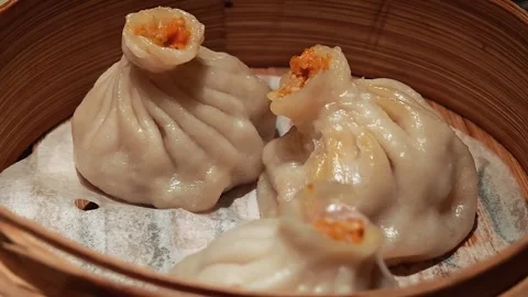Steamed Dumplings in Bamboo Steamer Stock Footage 338235318
