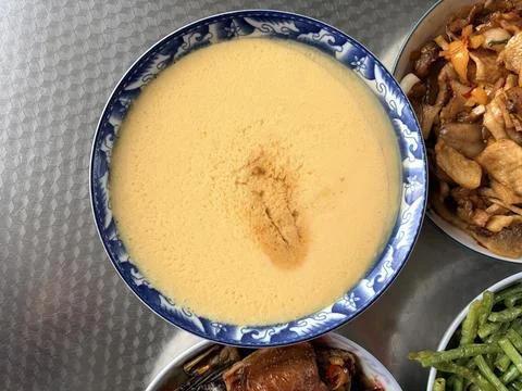 Steamed egg custard with minced meat topping. Stock Photos