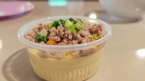 Steamed Egg with Minced Pork and Scallions Closeup. Видео 340077848