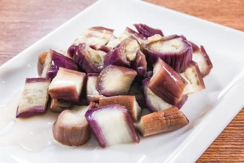 Steamed eggplant chunks with light dressing Stock Photos