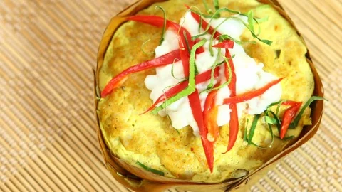 Steamed fish with curry paste or Hor mok , Thai food Stock Footage 93467984