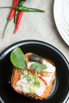 Steamed fish with curry paste. Stock Photos