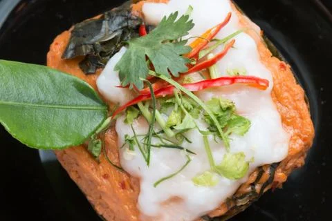 Steamed fish with curry paste. Stock Photos