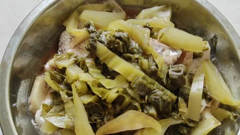 Steamed fish with salted vegetables Stock Footage 264157060