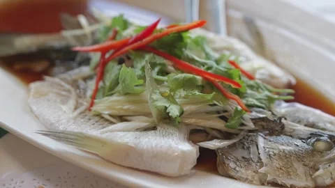 Steamed Fish with Soy Sauce on Serving Plate Stock Footage 344398716