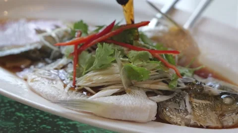 Steamed Fish with Soy Sauce on Serving Plate Stock Footage 344398818