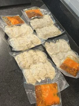 Steamed or fried Korean mandu dumplings filled with a savory mix of meat an.. Stock Photos