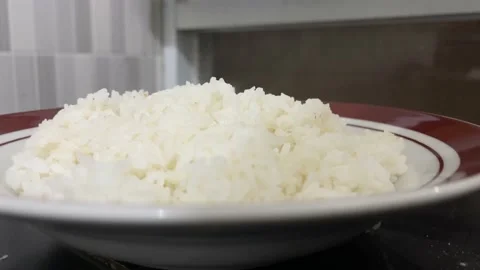Steamed rice on the plate 스톡 동영상 155439099