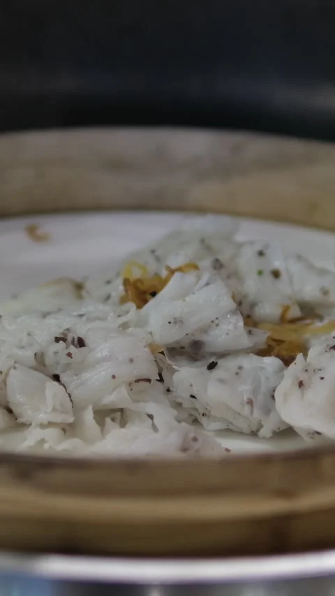 STEAMED THIN RICE Thai steamed rice noodles served with fresh vegetables and Stock Footage 310156001