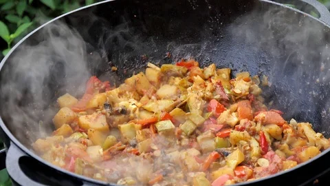 Steamed vegetables, bright multi-colored vegetable stew close-up. Steam 库存影片 119965578