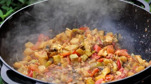 Steamed vegetables, bright multi-colored vegetable stew close-up. Steam Stock Footage 119966409