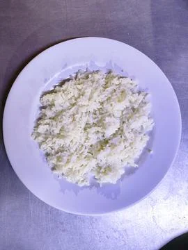 Steamed White Rice Served Fresh and Hot on a White Plate Stock Photos