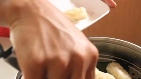 A steamer steams cabbage rolls. making cabbage dishes Stock Footage 334647271